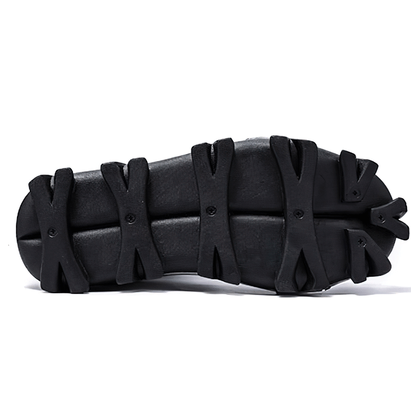 Bottom view of Gothic Punk breathable genuine leather boots showcasing unique tread design.