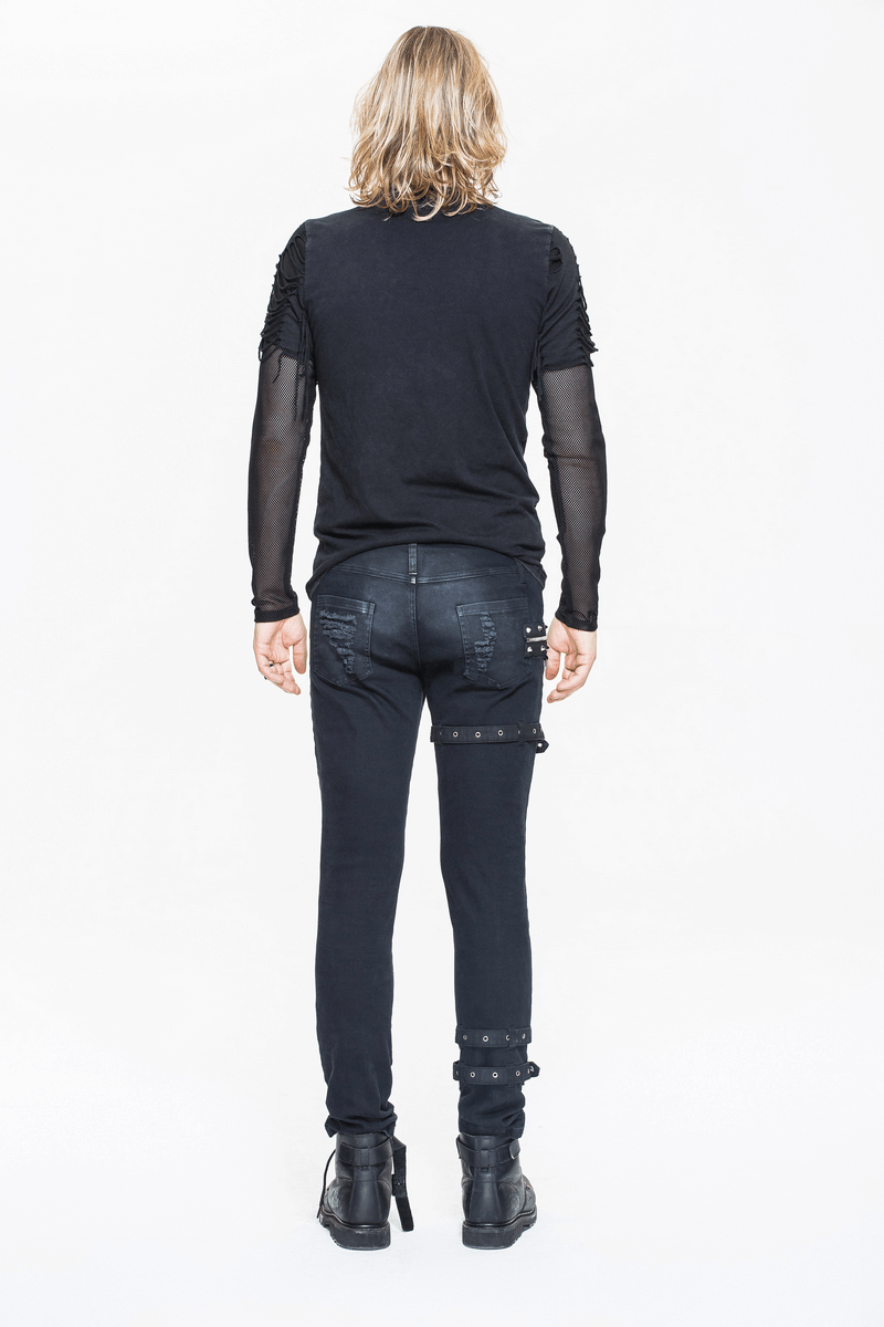 Back view of a man in a Gothic punk black long sleeve top with mesh sleeves and stylish ripped details.