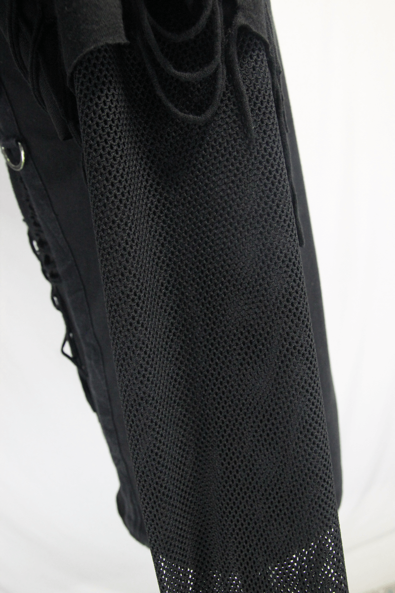 Close-up of black mesh sleeve detail on a men's gothic punk long sleeve top, showcasing trendy ripped style.