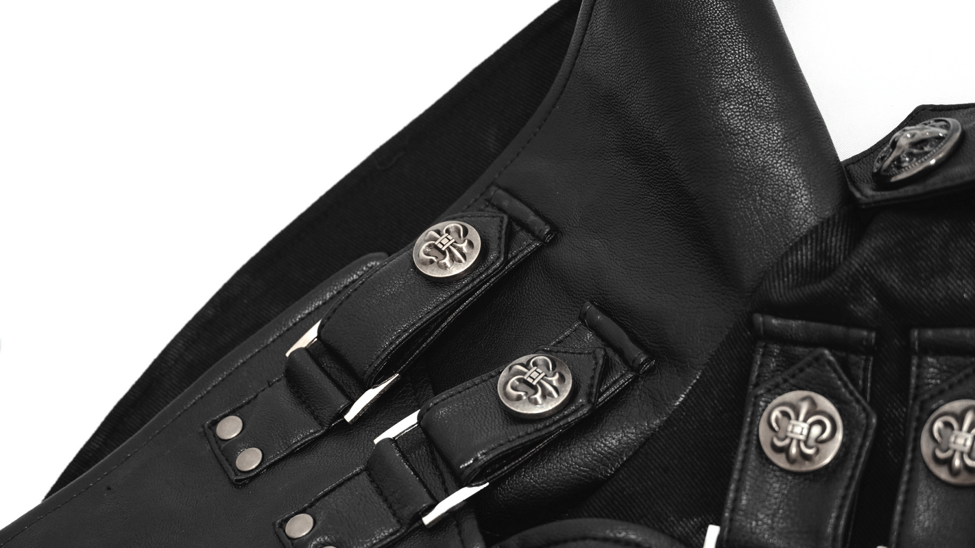 Close-up of silver metal rivets and buckles on a Gothic punk black trench coat.