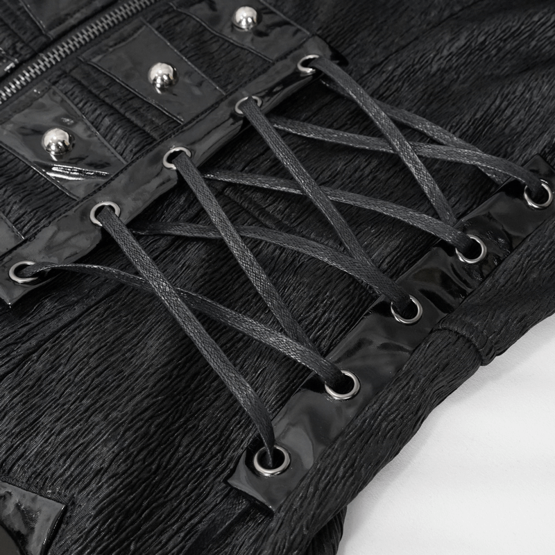 Close-up of lace-up accents on a black Gothic punk long coat for men with shiny eyelets and textured fabric.
