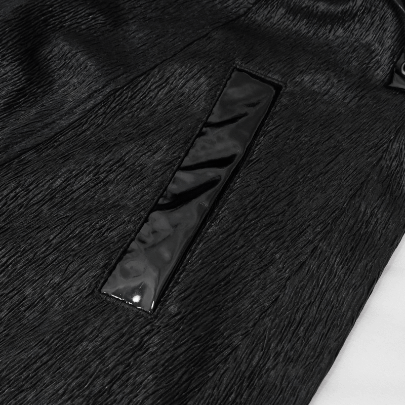 Close-up of black fabric with a glossy panel on a Gothic punk long coat for men.