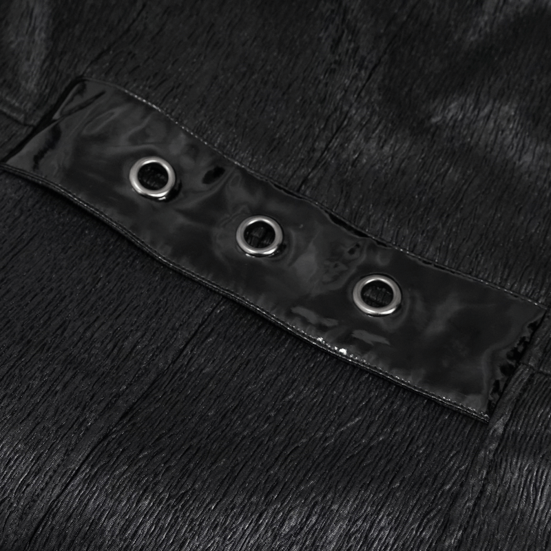 Close-up of black lace-up accents with metal grommets on a gothic punk coat for men.