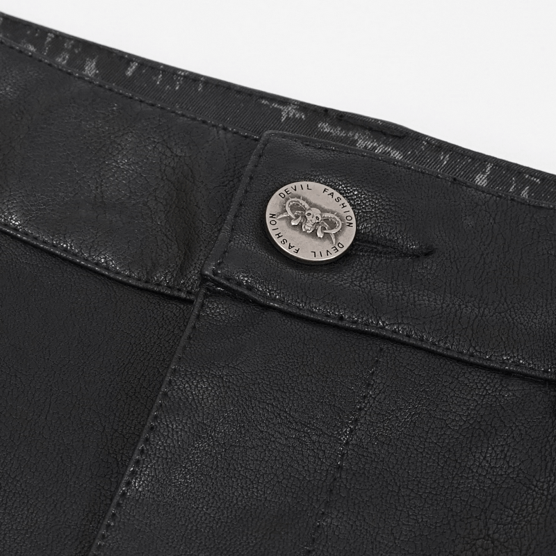 Close-up of black trousers showing stylish button detail and textured fabric, perfect for a gothic punk aesthetic.