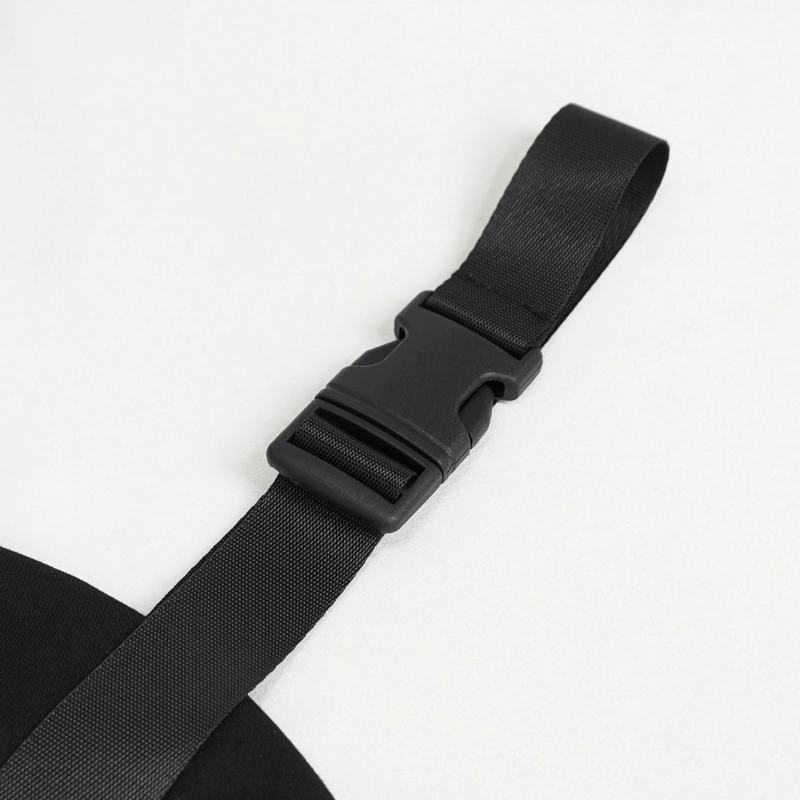 Close-up of an adjustable black buckle strap on a gothic punk top, showcasing its trendy design and functionality.