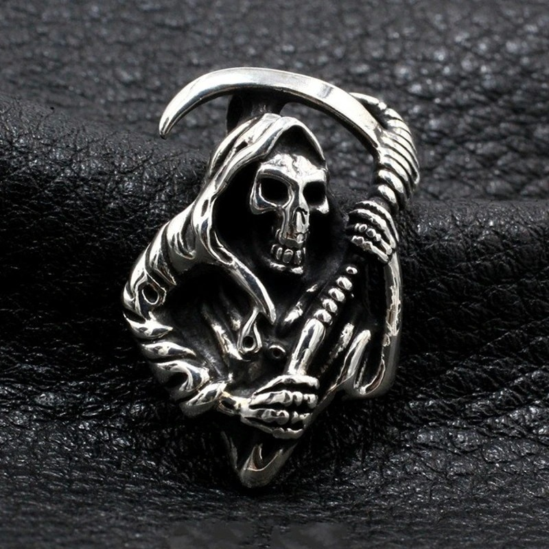 Gothic silver skeleton pendant featuring a reaper holding a scythe, perfect for trendy unisex jewelry.
