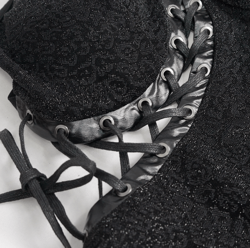 Close-up of gothic sexy black dress showcasing intricate lace-up details and adjustable straps for a seductive look.