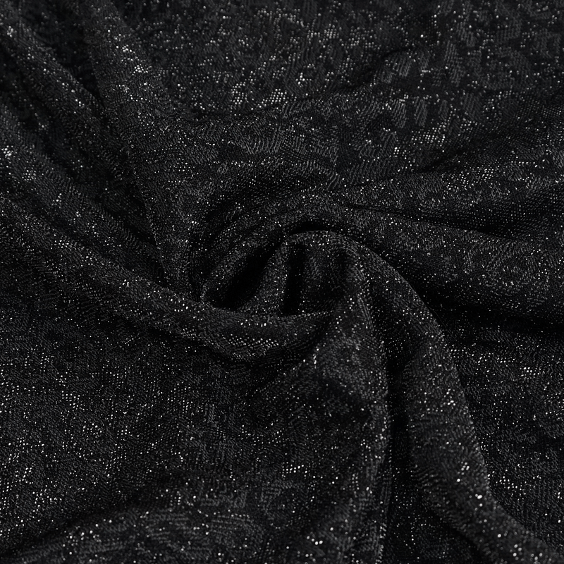Luxurious black fabric featuring a shiny, textured pattern ideal for gothic-style dresses.