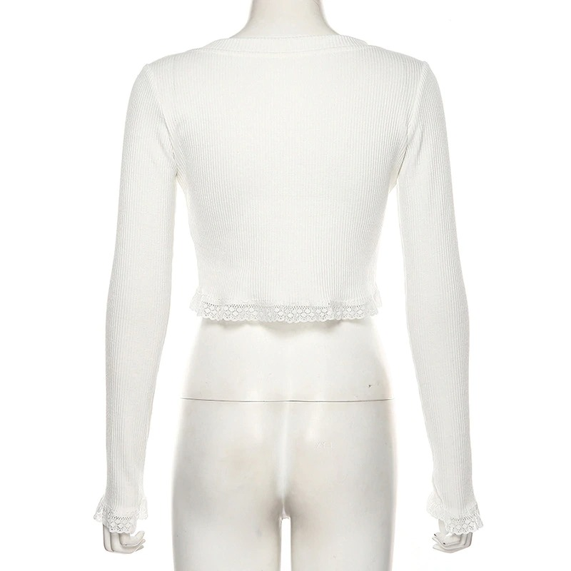 Back view of a white long sleeve crop top with lace trim, perfect for gothic and vintage autumn outfits.