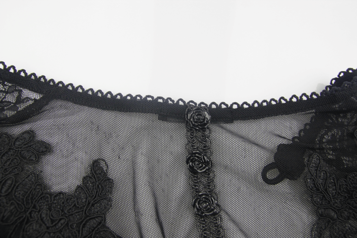 Close-up of the lace neckline and intricate rose buttons on a gothic steampunk midi dress.