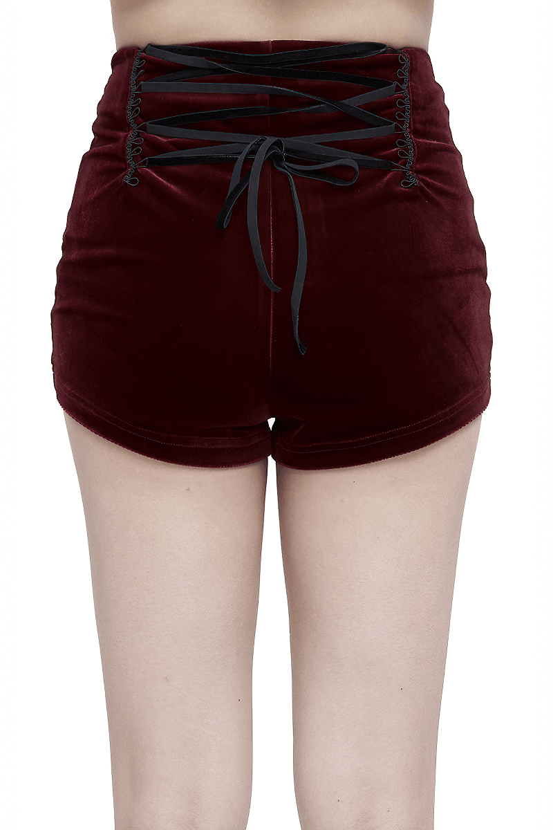Back view of gothic velvet shorts featuring lace-up design and stylish appliqué details, perfect for edgy outfits.