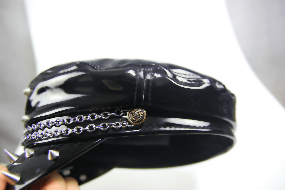 Gothic shiny vinyl military cap with spikes and chain, perfect for a stylish women's black hat in your gothic wardrobe.