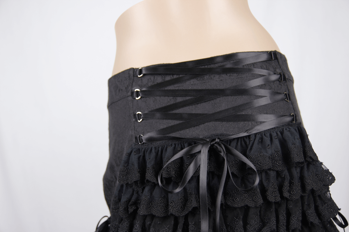 Gothic short skirt with lace tassels and ruffles, featuring stylish ribbon lacing and a flared hem.