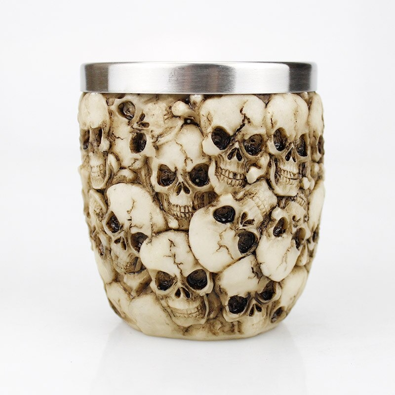 Gothic stainless steel skull shot glass, perfect for drinkware collection or unique gift, featuring detailed skull design.
