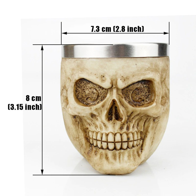 Gothic stainless steel skull shot glass with detailed design and dimensions: 7.3 cm width, 8 cm height.