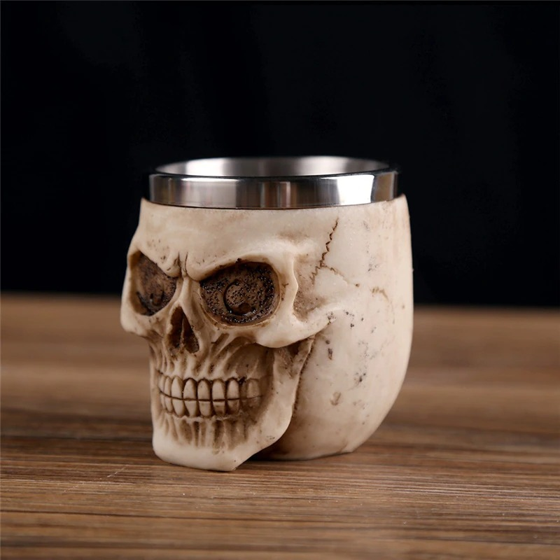 Gothic stainless steel skull shot glass, perfect for Halloween parties and unique drinkware collections.