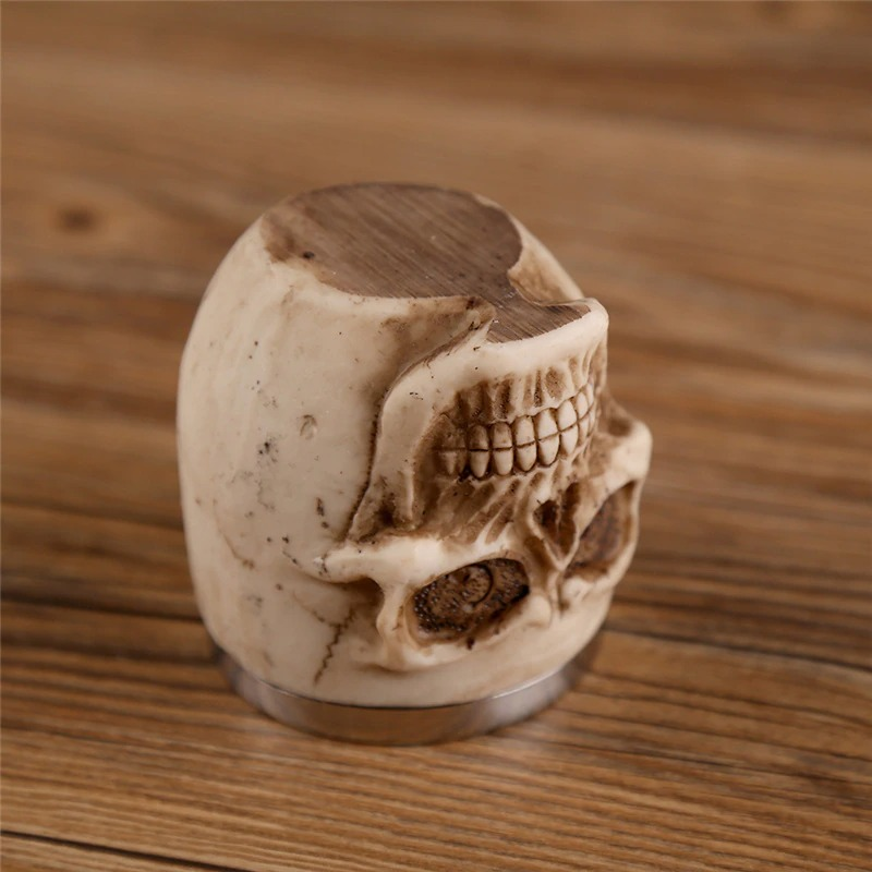 Gothic skull shot glass with detailed design, perfect for alternative style drinkware and unique gifts.