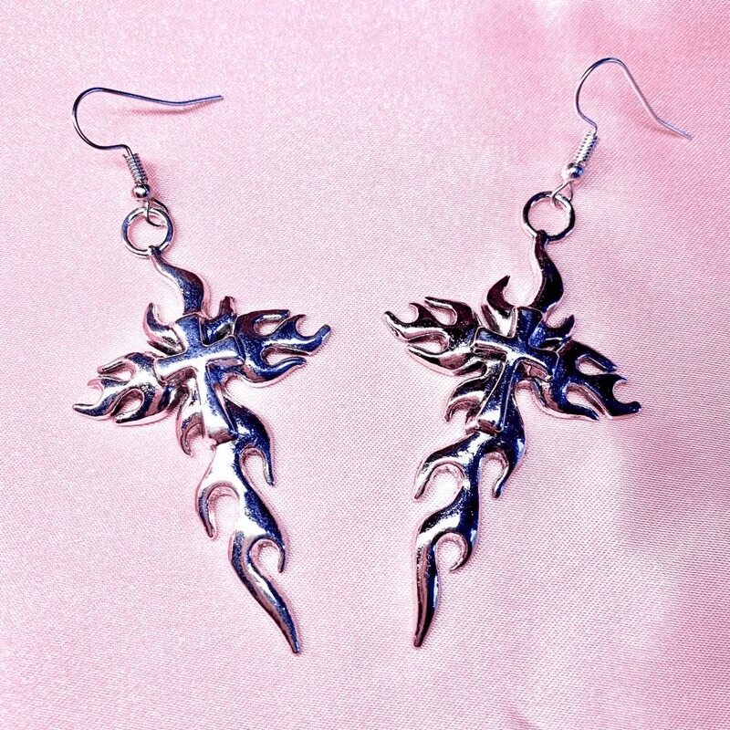 Gothic silver metal flaming cross long earrings for women, perfect for grunge fashion and stylish gothic outfits.