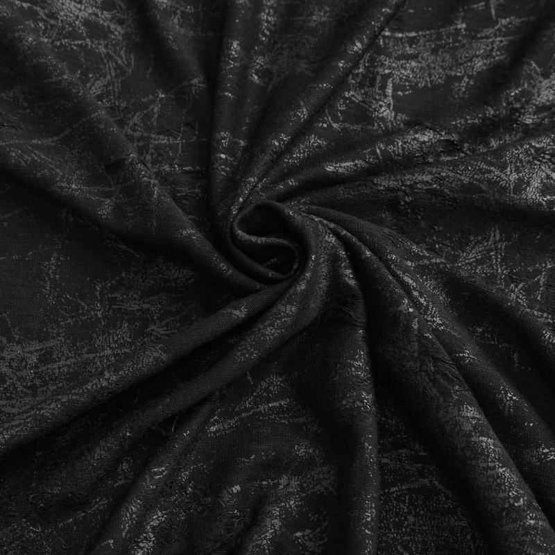 Close-up of black fabric with a textured pattern, ideal for gothic fashion and punk style clothing.