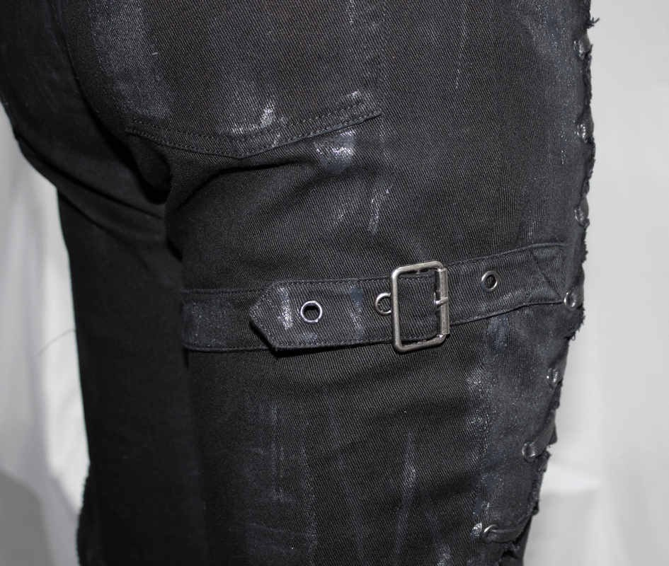 Close-up of Gothic slim fit black pants featuring a stylish belt buckle on the right leg accent.