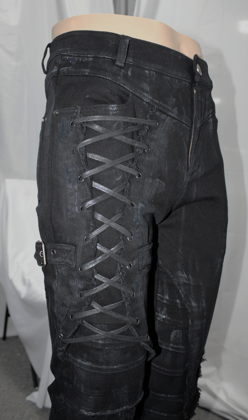 Gothic slim fit black pants featuring lace-up detail on the right leg and stylish belt buckle for a bold look.