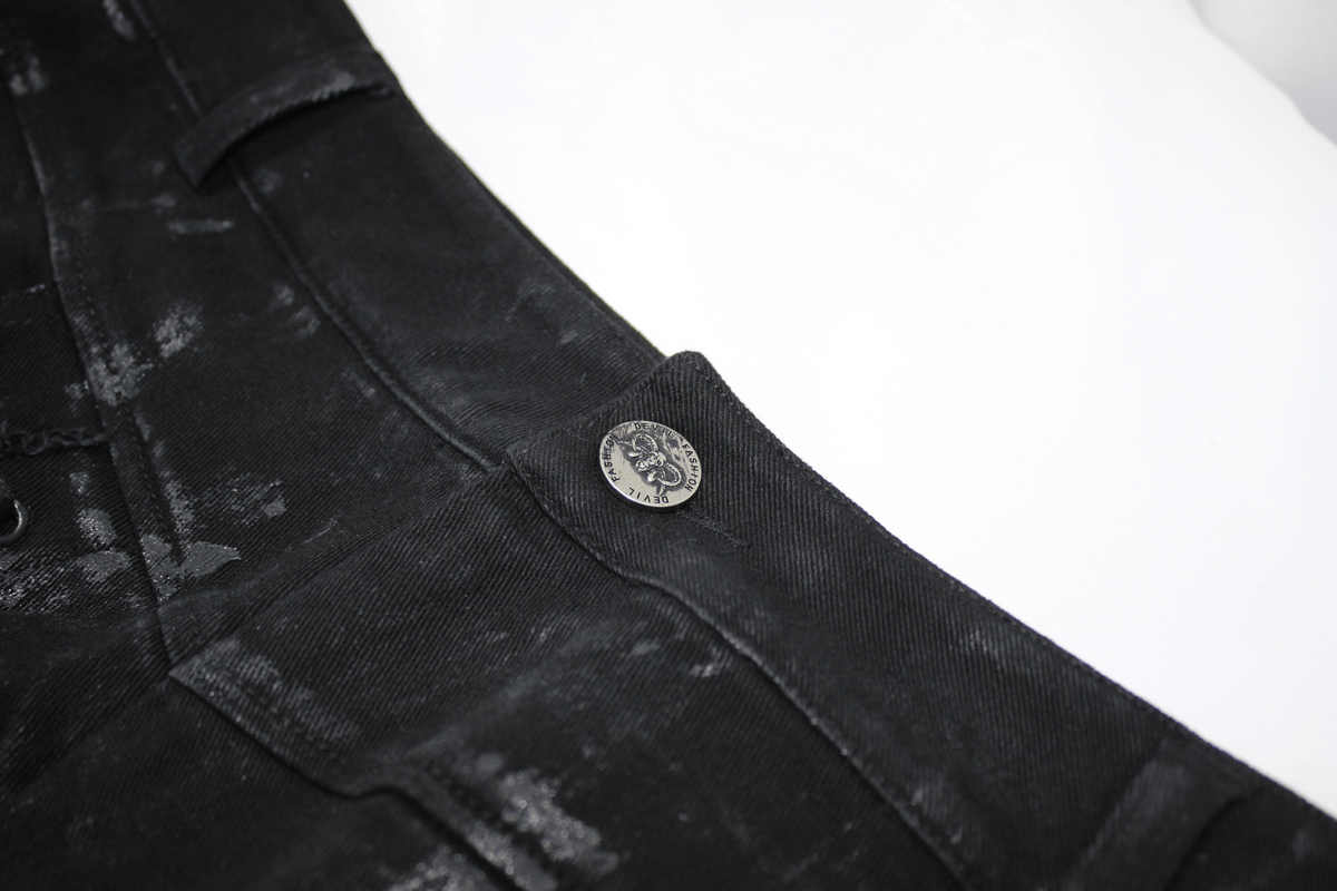 Close-up of Gothic slim fit black pants showing stylish button detail and unique texture.