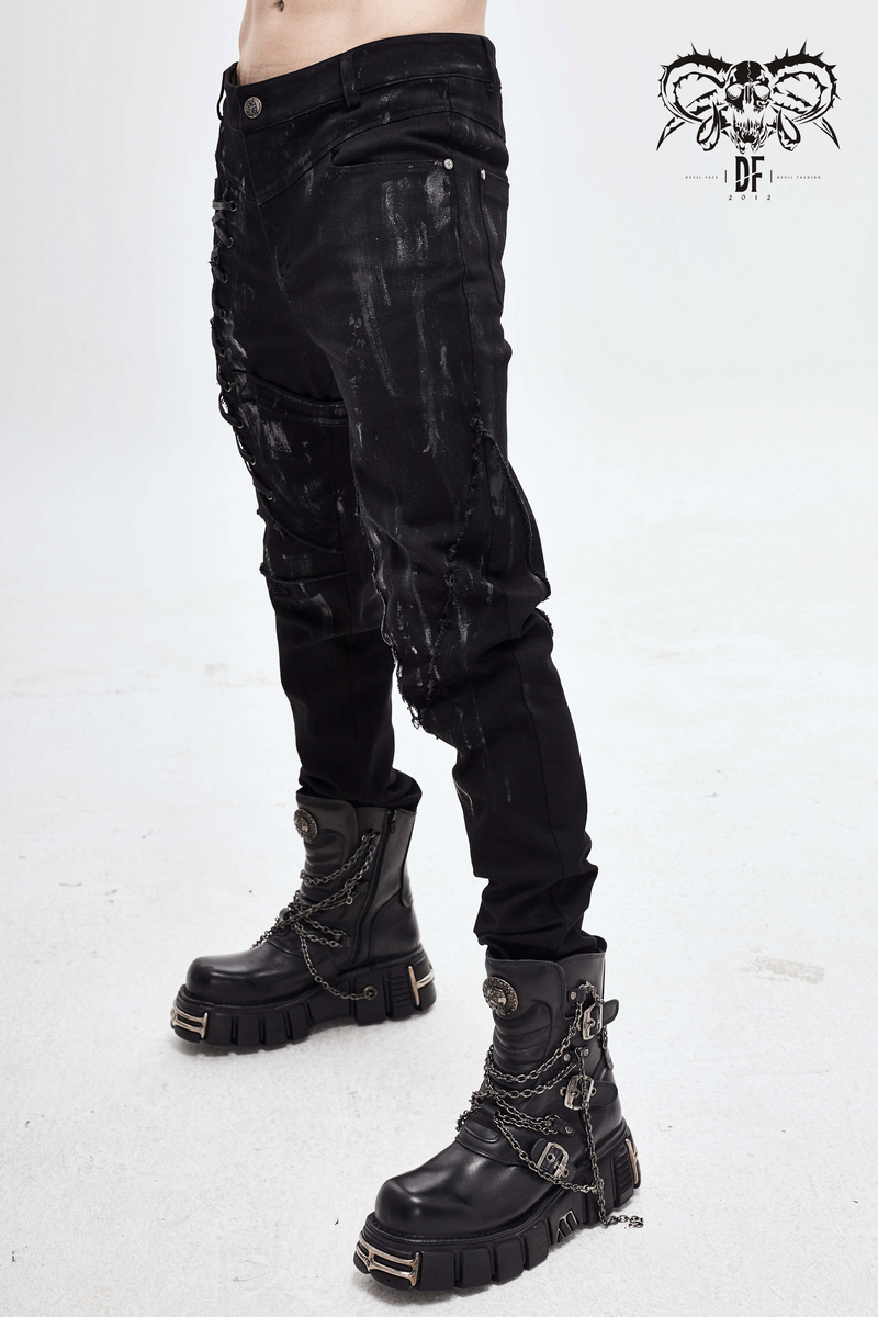 Gothic slim fit black pants with lace-up detail, paired with stylish chunky black boots.