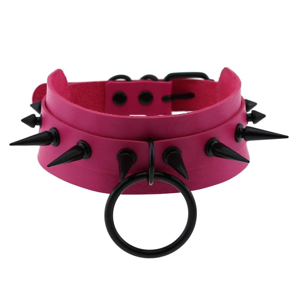 Gothic spiked choker in vibrant pink with black spikes and ring, perfect for unisex rave outfits and rock style.