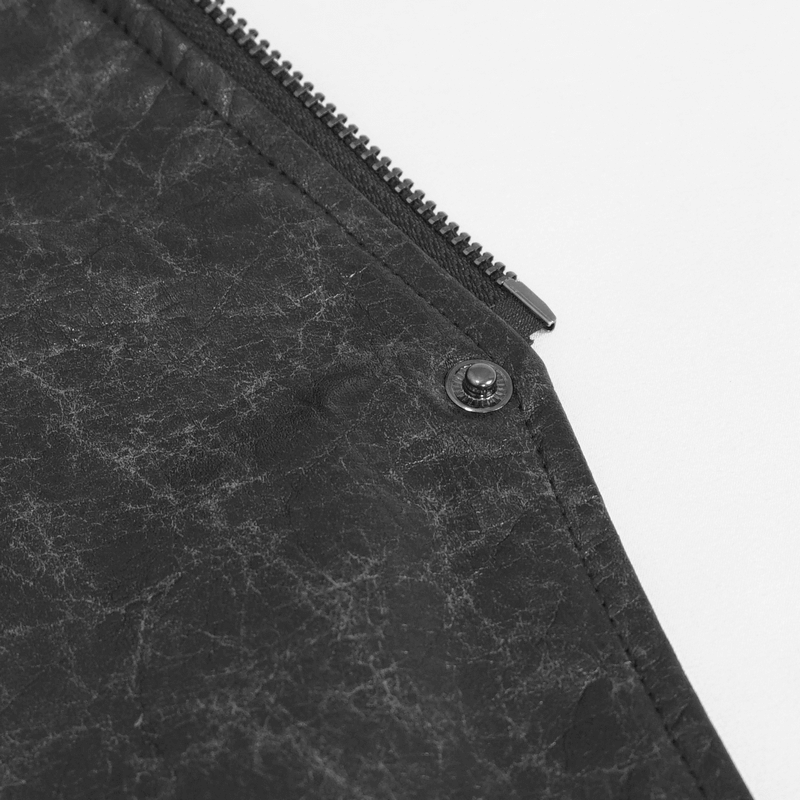 Close-up of the zipper and button detail on a men's gothic faux leather coat in punk style.