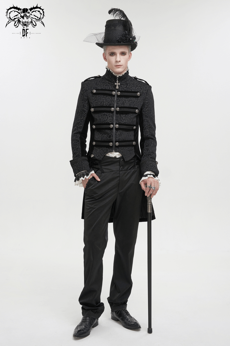 Stylish gothic model in black tailcoat with cross pendant, high hat, and cane, showcasing retro elegance.