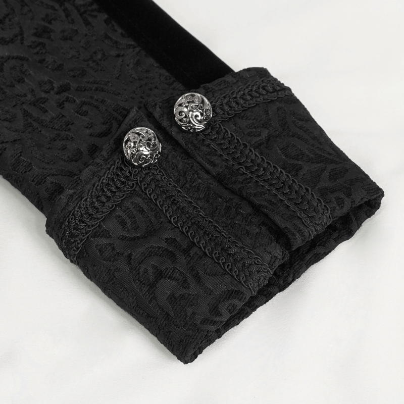 Close-up of gothic black tailcoat sleeve with intricate pattern and retro buttons for a stylish men's fashion look.