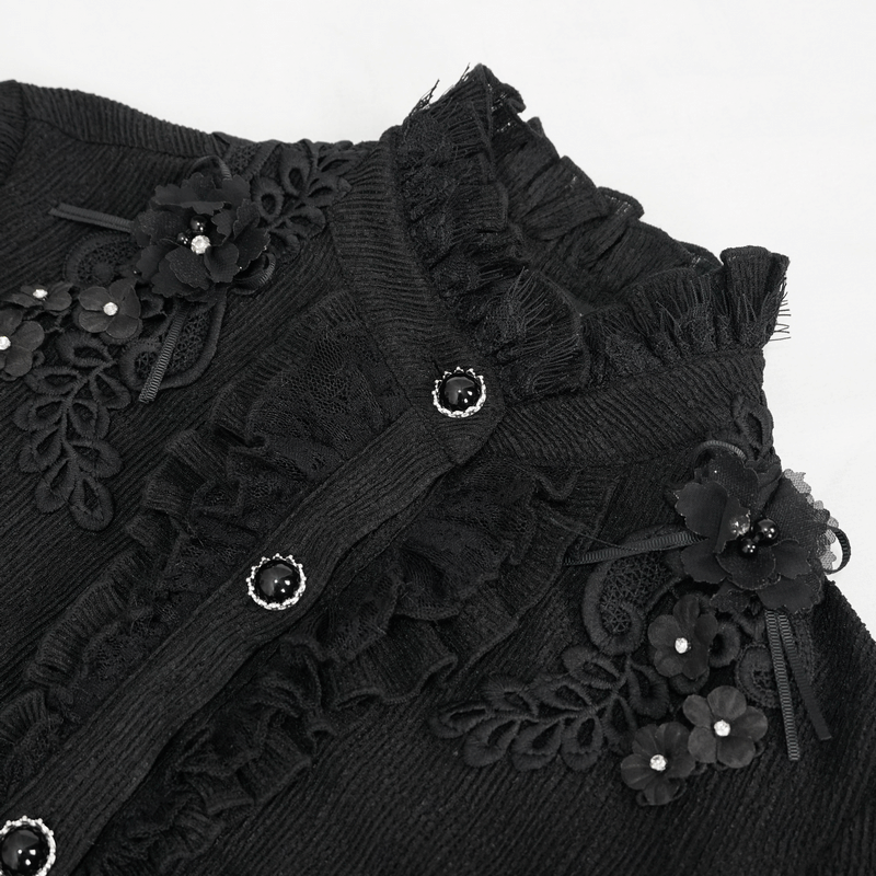 Gothic women's long sleeve blouse with appliquéd floral design and buttons, showcasing elegant ruffled collar details.