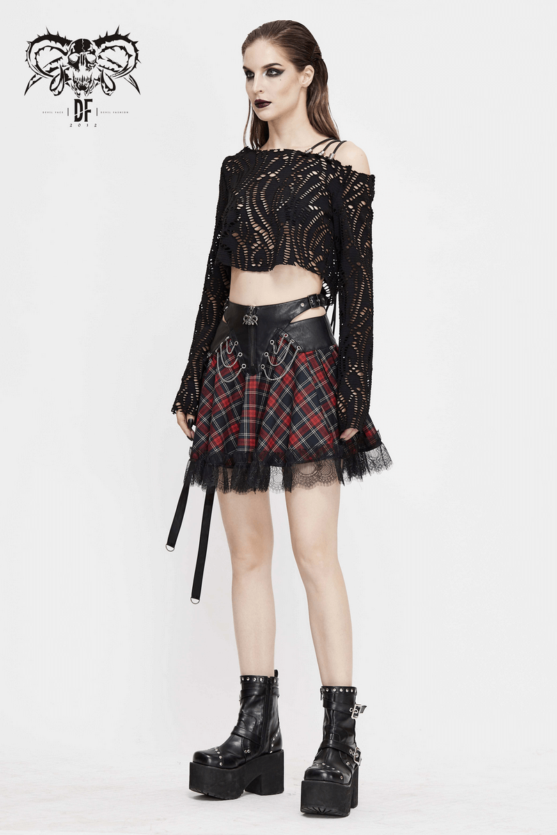 Model showcasing a Gothic strappy plaid mini skirt with chains, paired with a lace crop top and chunky platform boots.