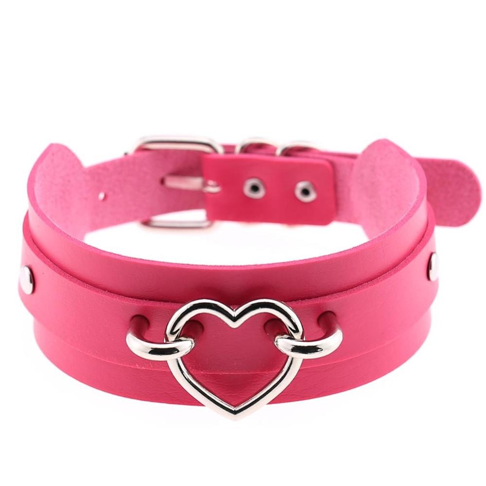 Pink gothic heart choker necklace with silver heart clasp, perfect for adding a cute touch to witch outfits and goth style.