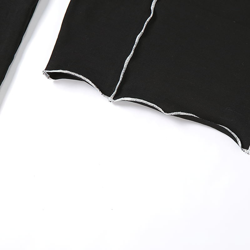 Close-up of gothic style hollow out sleeves on a black women's crop top, showcasing unique design details and comfort.