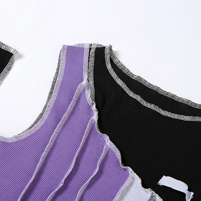Close-up of Gothic Style Purple and Black Hollow Out Sleeve Crop Top showcasing texture and color contrast.