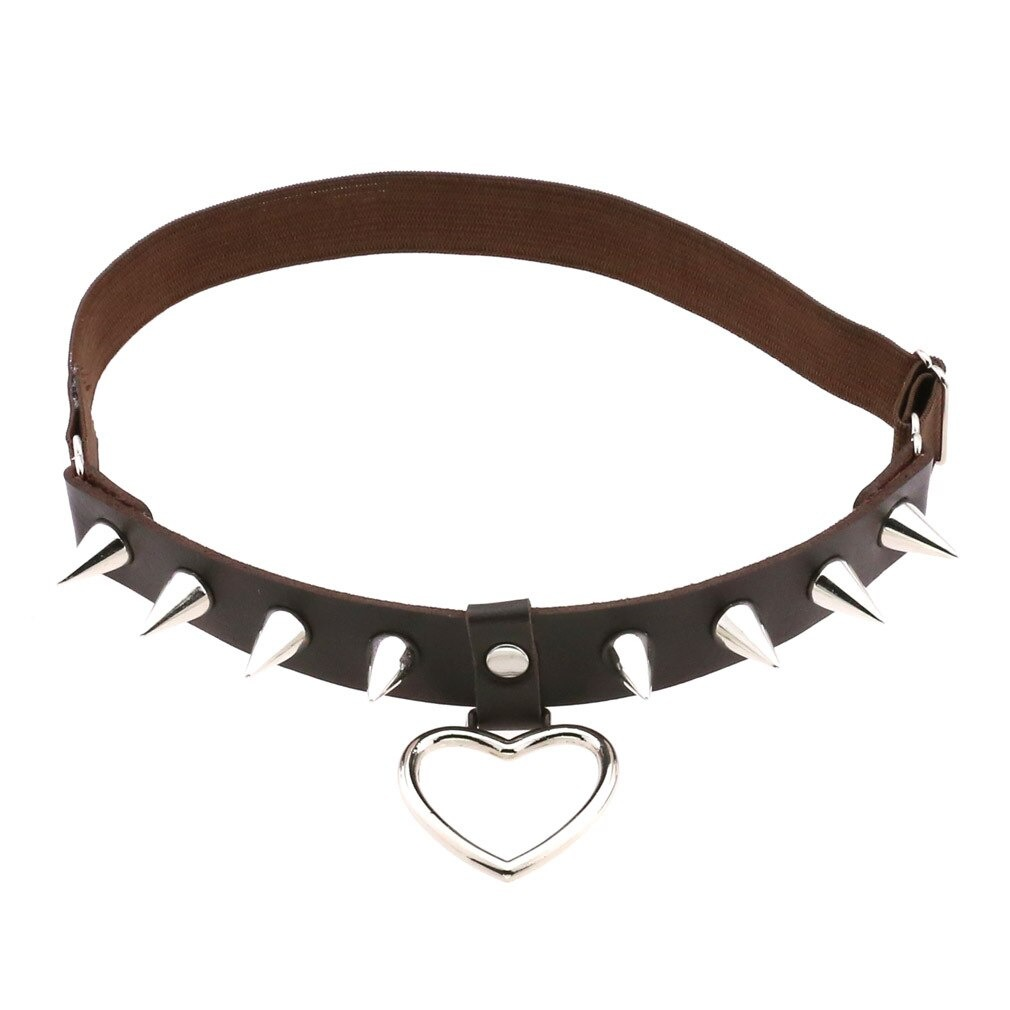 Gothic style leg garter belt with silver spikes and heart pendant in PU leather, perfect for edgy fashion.