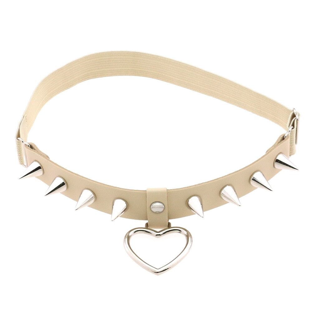 Gothic style PU leather leg garter belt featuring silver spikes and a heart pendant, perfect for edgy women's fashion.