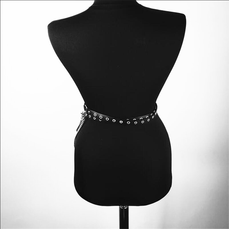 Back view of a gothic style PU leather adjustable body harness belt with metal rings and chain details.