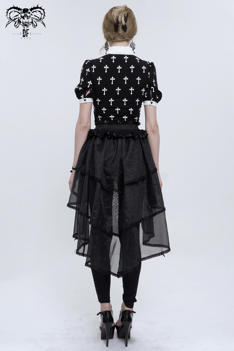 Stylish model wearing a Gothic short sleeve blouse with white crosses, paired with a layered black skirt.
