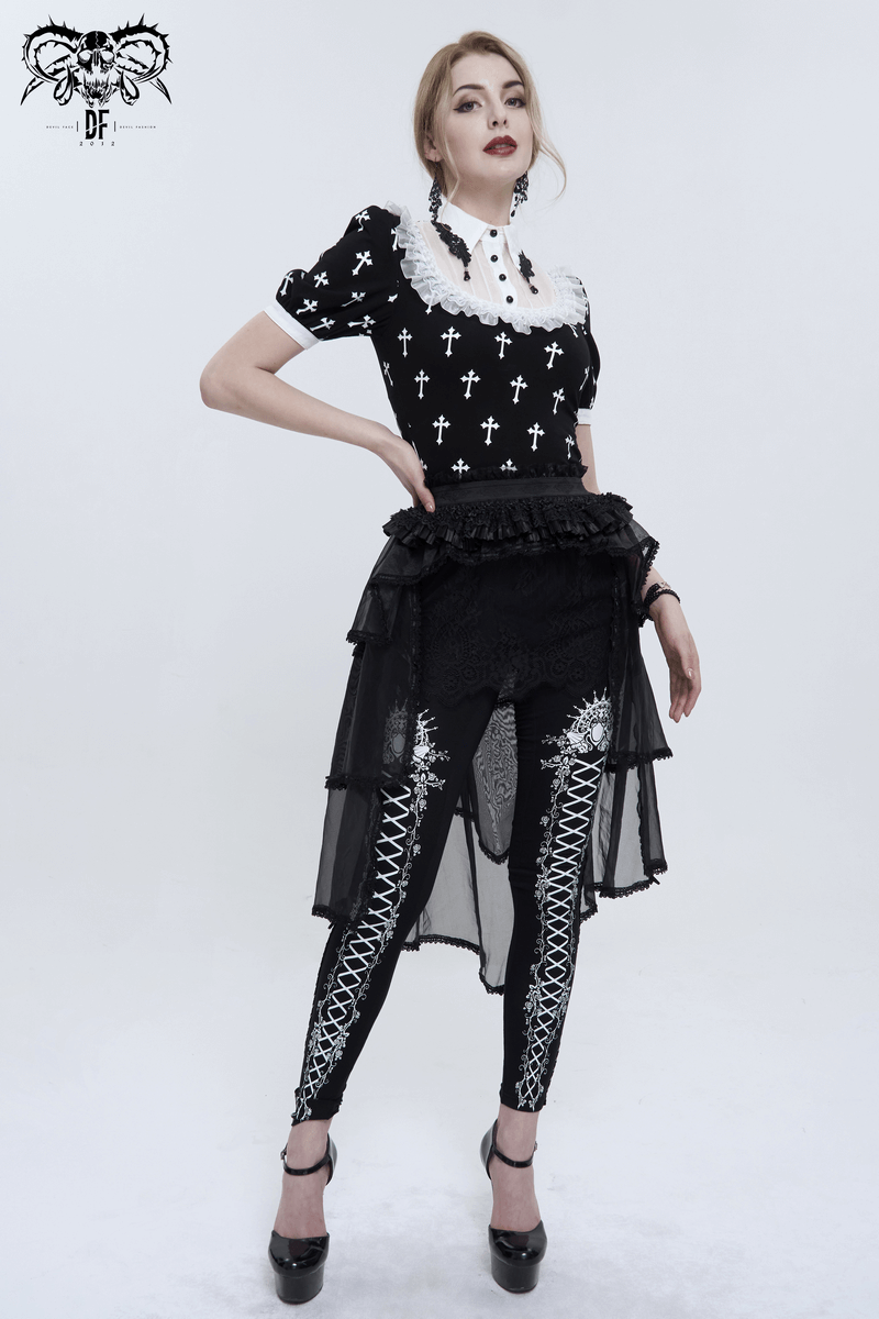 Stylish model wearing a Gothic short sleeve blouse with white crosses, paired with a layered skirt and patterned leggings.