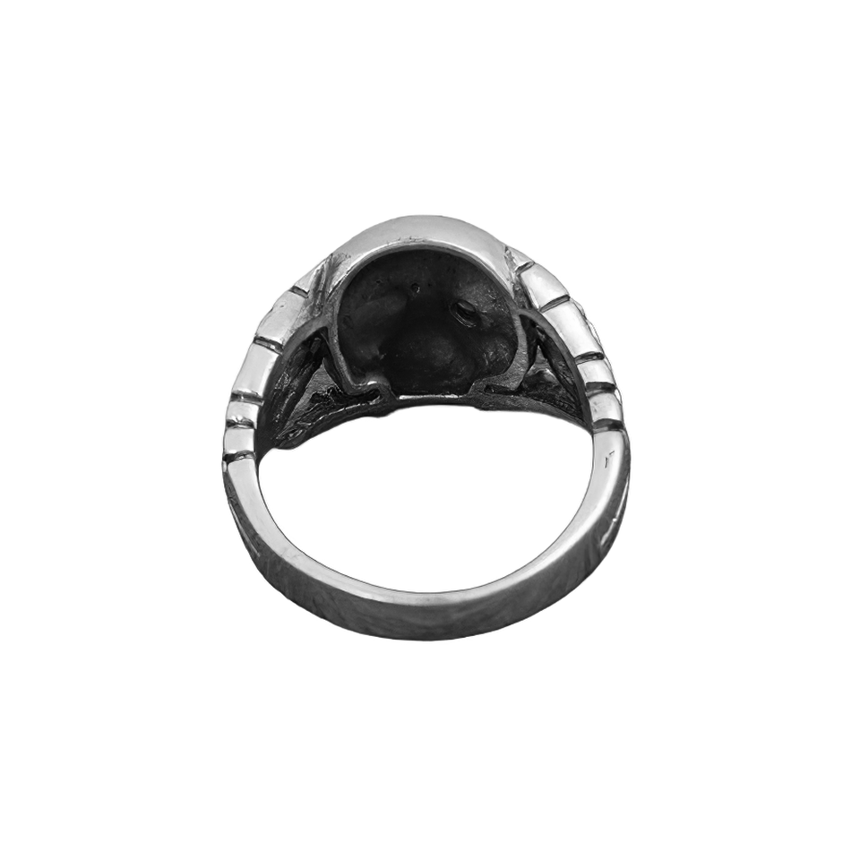 Gothic style sterling silver ring featuring a skull design, showcasing the detailed underside of the trendy accessory.