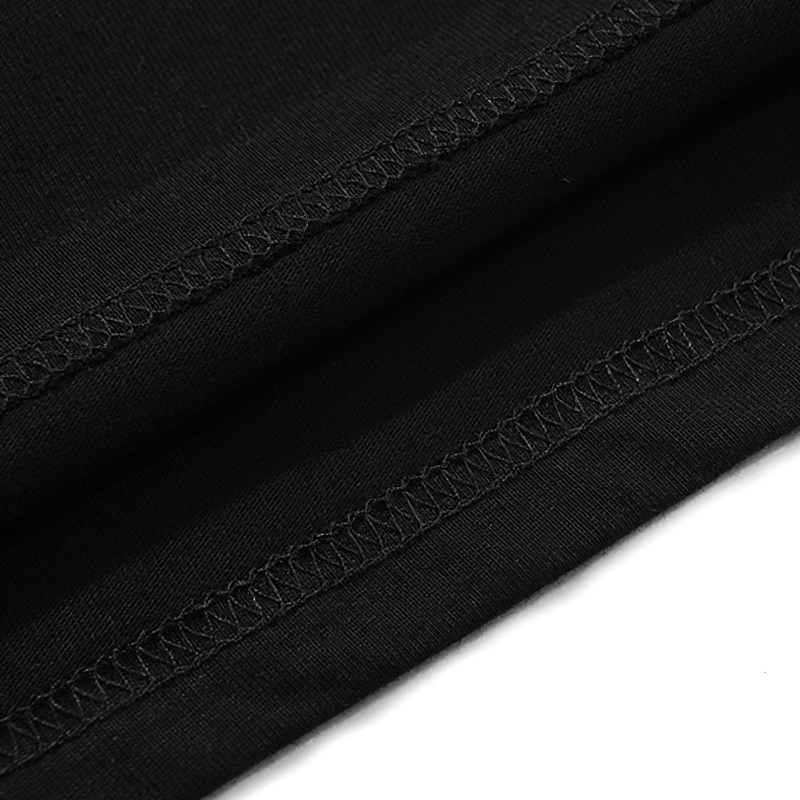 Close-up of the edges of a black Gothic style casual loose T-shirt, showcasing stitching details.