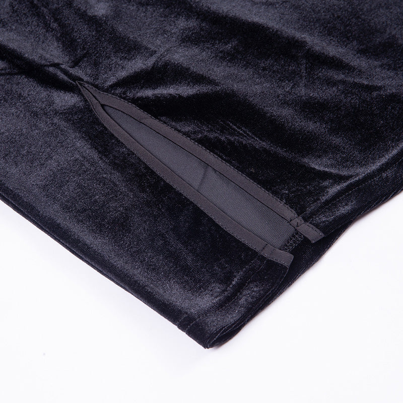 Close-up of black velvet fabric showcasing the elegant texture and design details of a gothic style dress.