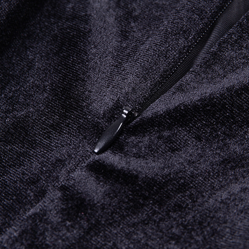 Close-up of gothic style velvet fabric with zipper detail, perfect for women's alternative fashion dress.