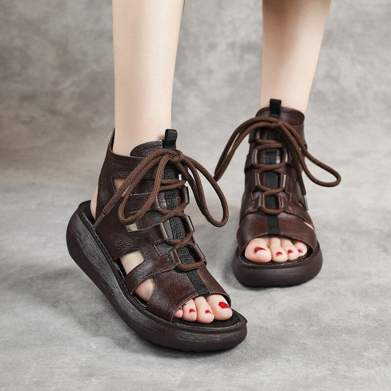 Gothic style women's genuine leather sandals with lace-up design and comfortable sole, perfect for alternative fashion.