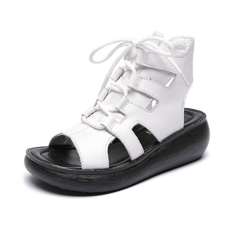 Gothic style women's white genuine leather sandals with lace-up design and comfortable sole.