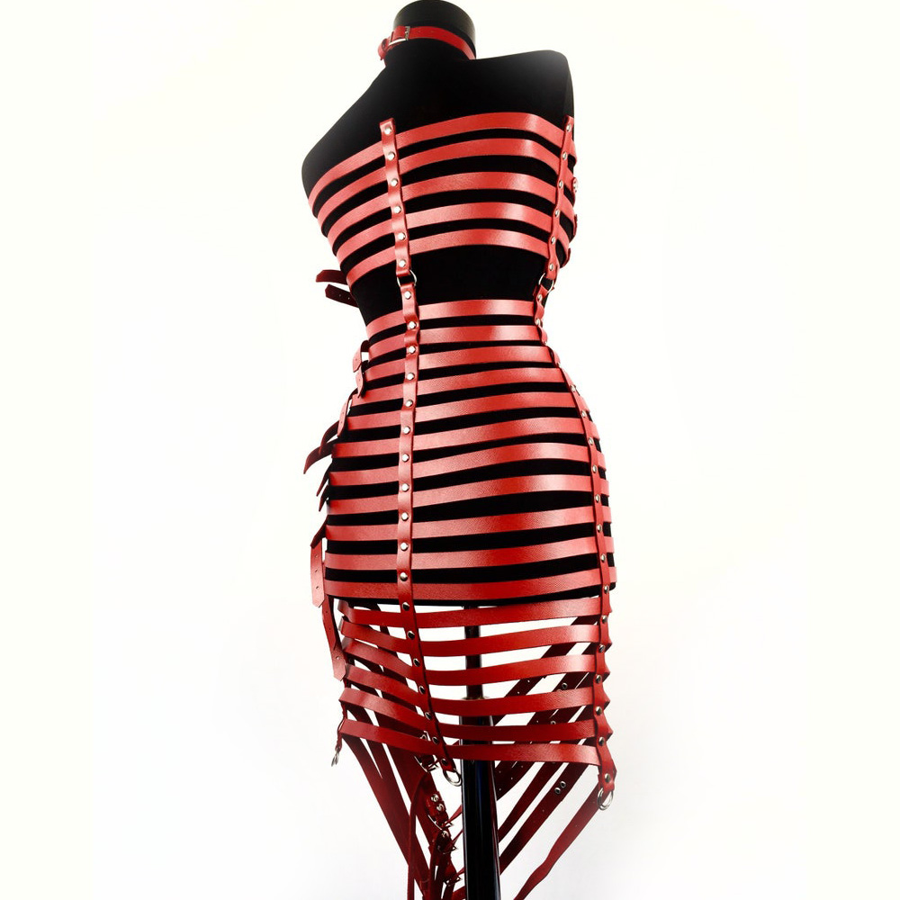 Gothic style women's red PU leather harness dress with stylish silver fittings and edgy strappy design.