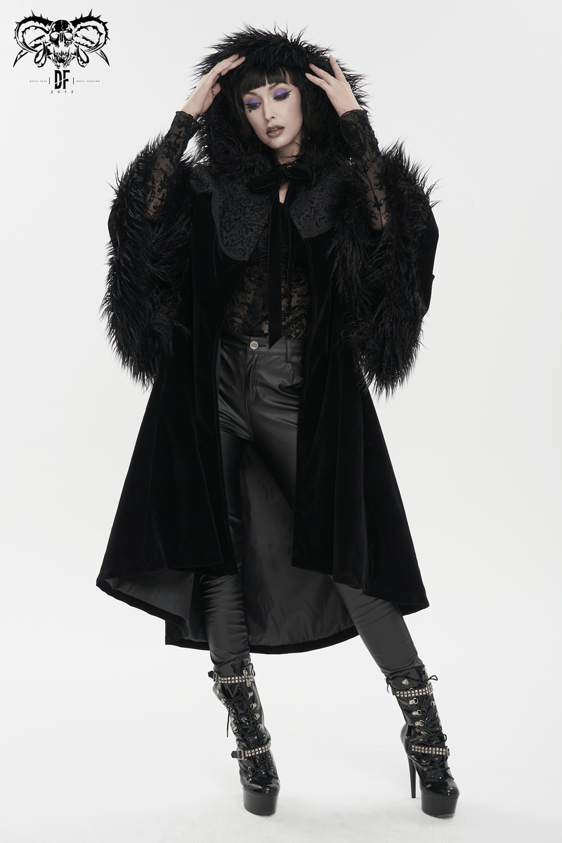 Gothic velvet long cape with fur hood, featuring wide sleeves and stylish black outfit.