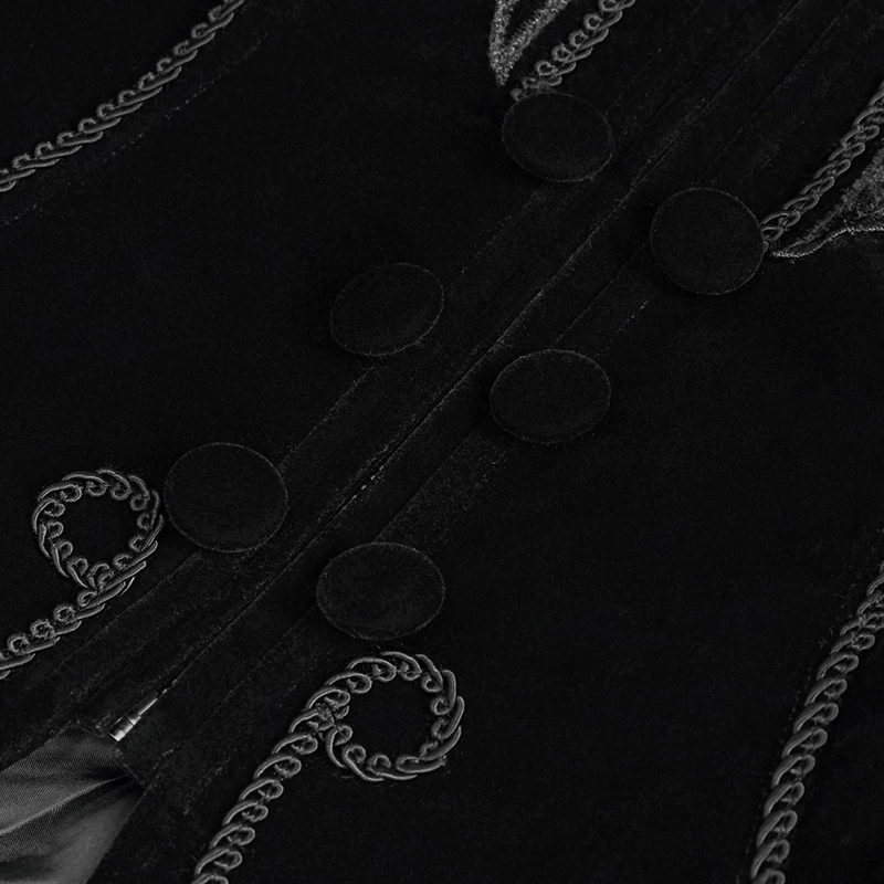 Close-up of black velvet zipper jacket showing decorative buttons and intricate lace appliqué details.